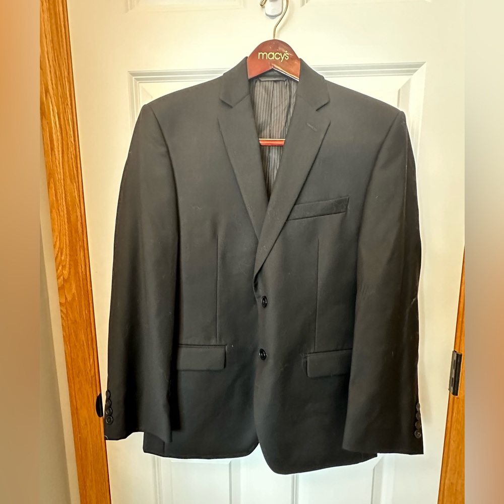 Men’s black wool dress jacket by Calvin Klein. Slim fit, 36S